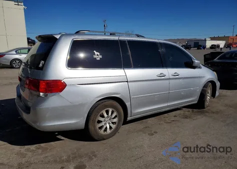 2010 Honda Odyssey Exl z USA, uszkodzony, nr VIN 5FNRL3H72AB078929